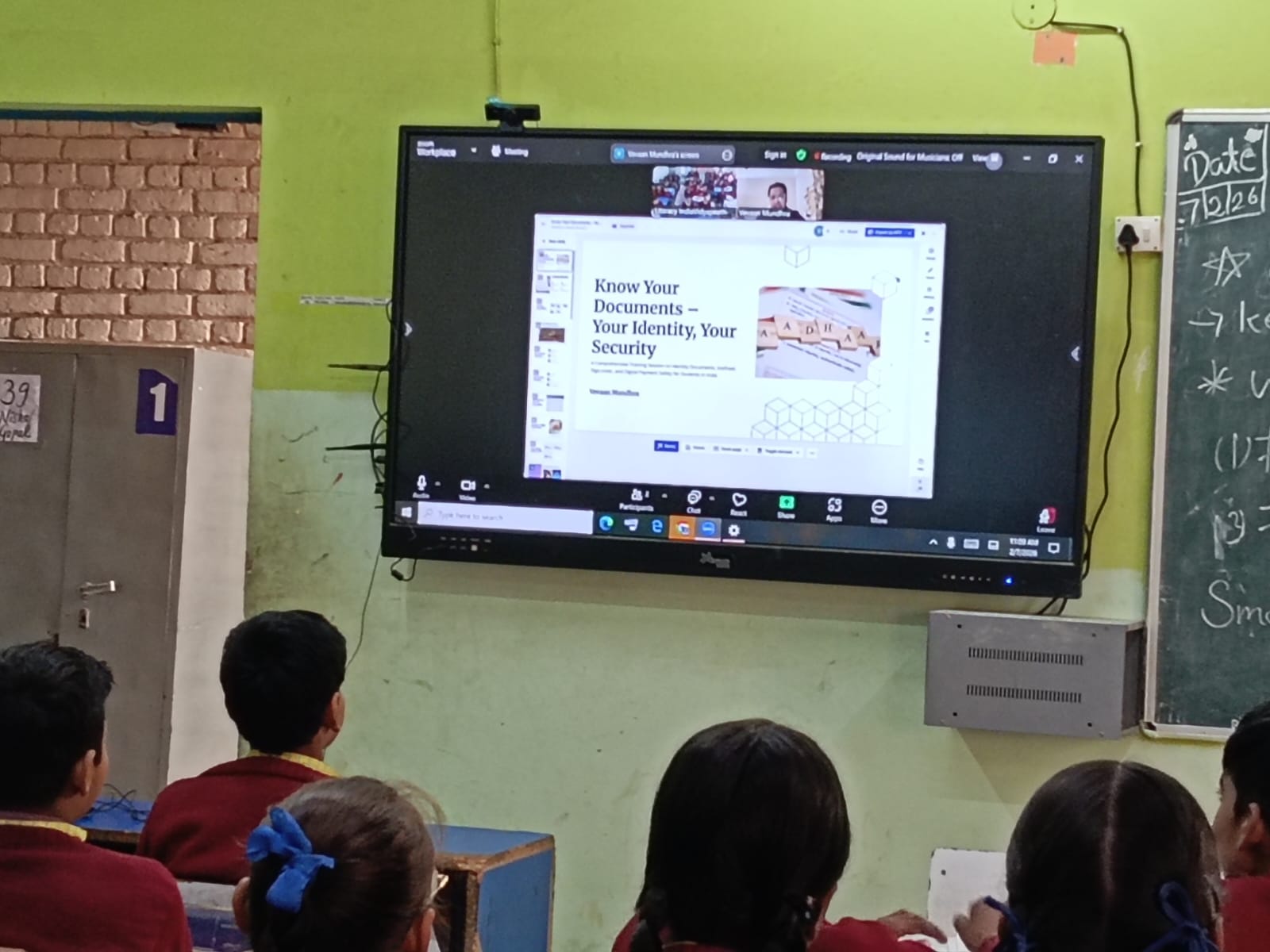 A curriculum slide on the classroom screen — Know Your Documents — Your Identity, Your Security