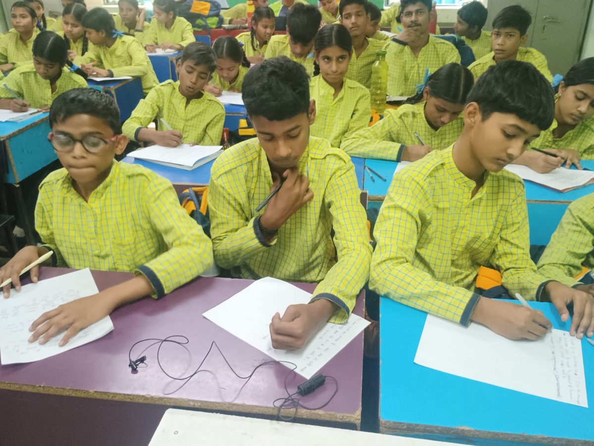 Close-up of students paying attention in class