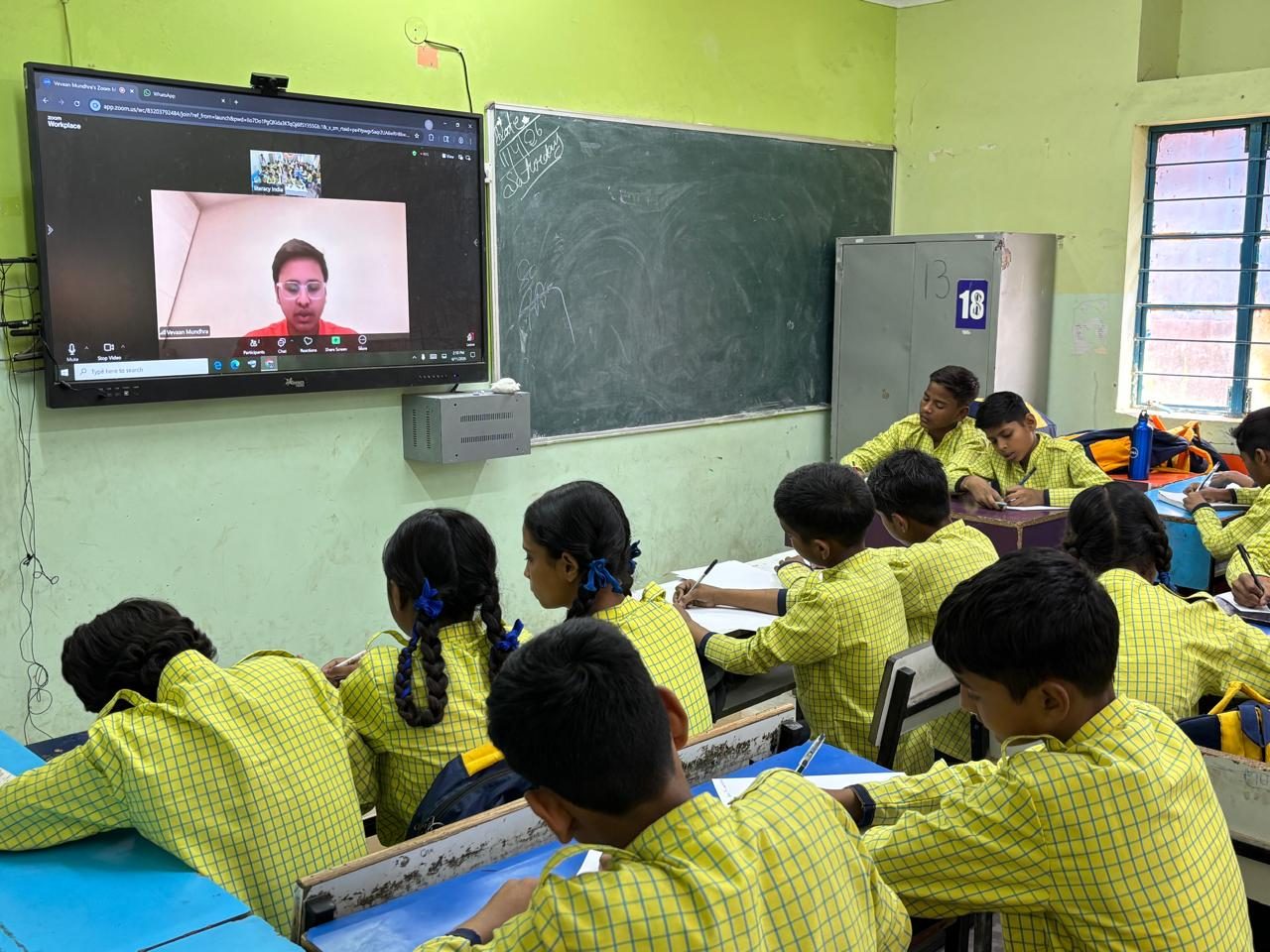 Students writing during a workshop